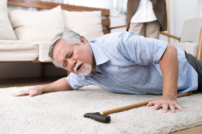 an old man fall on to the floor